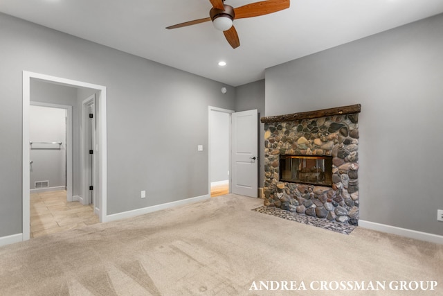 17946 Robbins Rd, Grand Haven, MI 49417 - unfurnished living room with carpet floors, a ceiling fan, a fireplace, baseboards, and recessed lighting