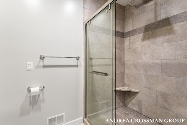 17946 Robbins Rd, Grand Haven, MI 49417 - bathroom with a stall shower and baseboards