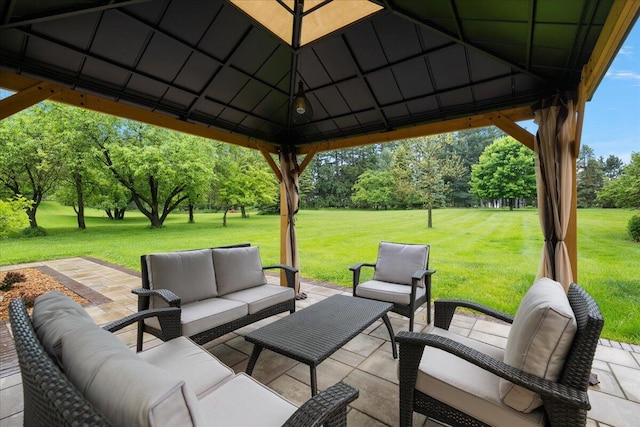 4047 Ramsgate Ct, Ann Arbor, MI 48103 - view of patio featuring an outdoor living space, a gazebo, and view of wooded area