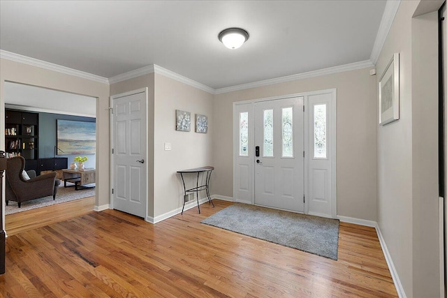 4047 Ramsgate Ct, Ann Arbor, MI 48103 - entrance foyer with light wood-style floors, crown molding, and baseboards