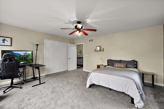 4047 Ramsgate Ct, Ann Arbor, MI 48103 - bedroom with carpet flooring, baseboards, a ceiling fan, a desk, and a closet