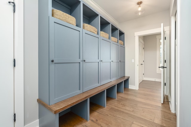 6606 Spaniel Dr, Kalamazoo, MI 49009 - mudroom featuring light wood-style floors and baseboards