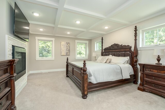 6606 Spaniel Dr, Kalamazoo, MI 49009 - bedroom with light colored carpet, coffered ceiling, multiple windows, beam ceiling, and recessed lighting