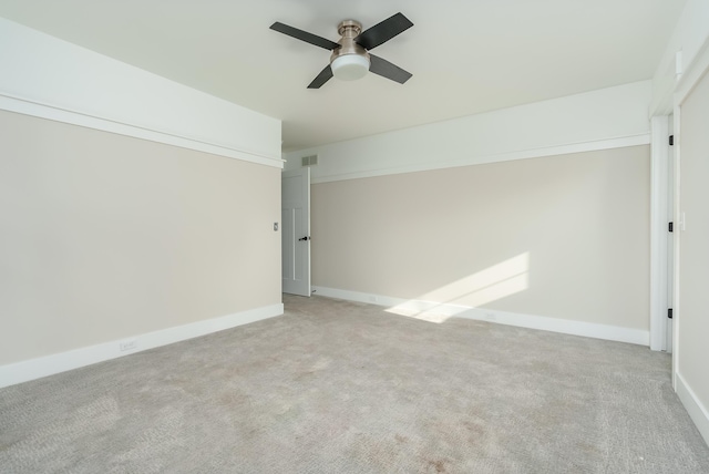 6606 Spaniel Dr, Kalamazoo, MI 49009 - spare room with ceiling fan, light carpet, and baseboards