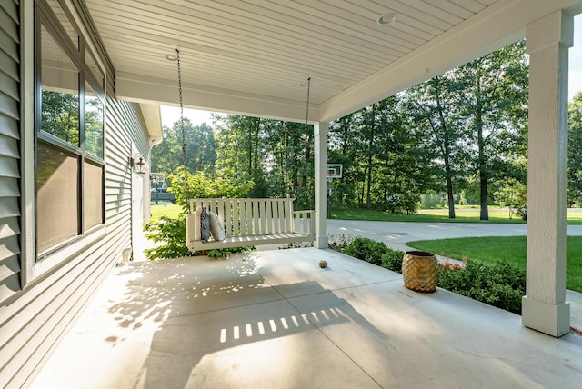 6606 Spaniel Dr, Kalamazoo, MI 49009 - porch featuring view of scattered trees and a lawn