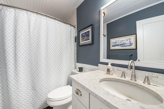 9787 Center Ln, Canadian Lakes, MI 49346 - full bath with vanity, toilet, and a shower with shower curtain