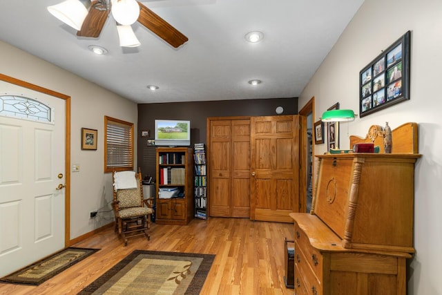 13341 Clausen Rd, Trufant, MI 49347 - foyer entrance with light wood-style floors, ceiling fan, baseboards, and recessed lighting