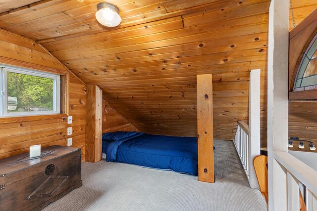 13341 Clausen Rd, Trufant, MI 49347 - unfurnished bedroom featuring carpet, lofted ceiling, wood ceiling, and wood walls