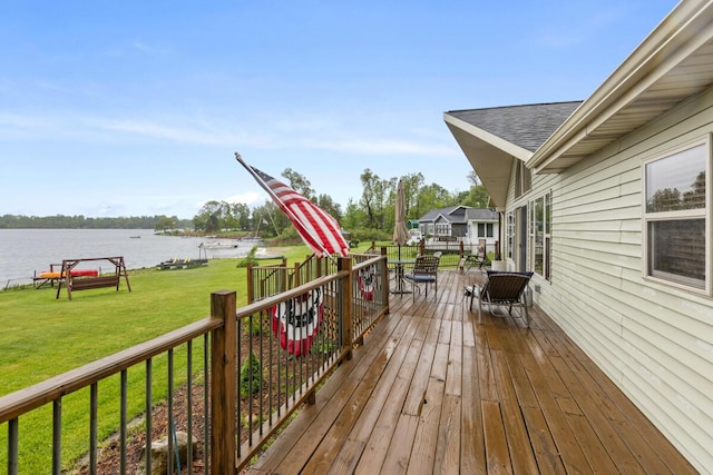 13341 Clausen Rd, Trufant, MI 49347 - deck with a water view and a lawn