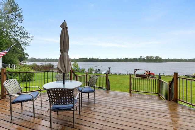 13341 Clausen Rd, Trufant, MI 49347 - wooden terrace featuring a water view and a yard