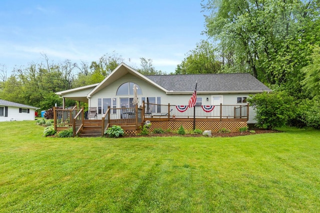 13341 Clausen Rd, Trufant, MI 49347 - view of front facade with a deck and a front lawn