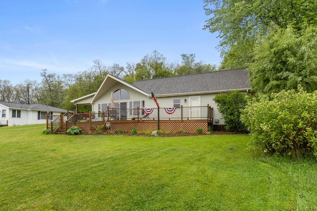 13341 Clausen Rd, Trufant, MI 49347 - view of front of home with a deck and a front yard