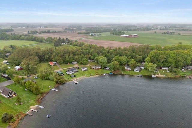 13341 Clausen Rd, Trufant, MI 49347 - aerial view of property's location with a nearby body of water, rural landscape, and a tree filled landscape