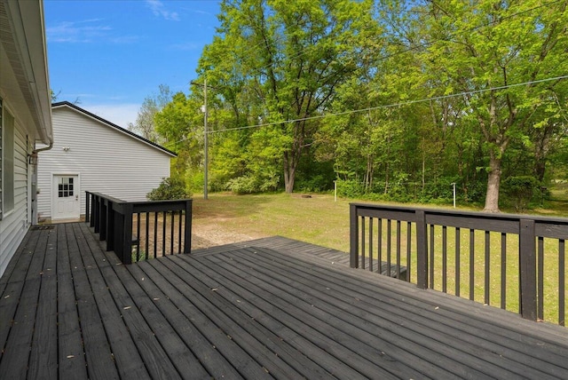 1710 215th Ave, Morley, MI 49336 - wooden deck featuring a lawn