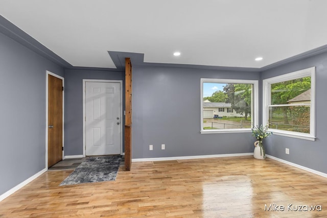 945 NW Dorothy St NW, Grand Rapids, MI 49504 - foyer entrance with wood finished floors, healthy amount of natural light, baseboards, and recessed lighting