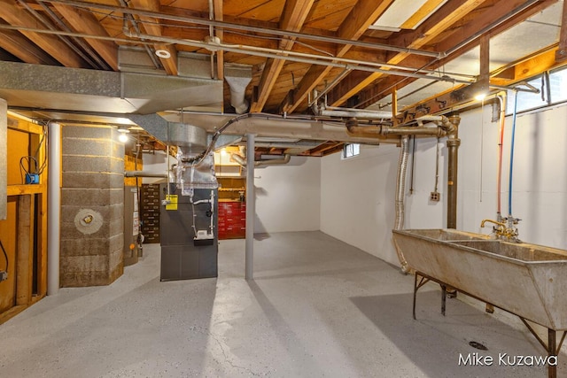 945 NW Dorothy St NW, Grand Rapids, MI 49504 - basement featuring heating unit