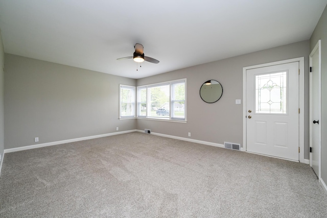 481 Gilson St, Coloma, MI 49038 - carpeted entrance foyer featuring a ceiling fan and baseboards