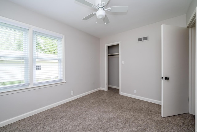 481 Gilson St, Coloma, MI 49038 - unfurnished bedroom featuring carpet floors, baseboards, a closet, and a ceiling fan