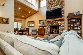 46306 Station Rd, New Buffalo, MI 49117 - living room with a fireplace, healthy amount of natural light, recessed lighting, high vaulted ceiling, and wooden ceiling