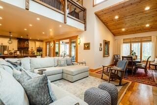 46306 Station Rd, New Buffalo, MI 49117 - living room with recessed lighting, a towering ceiling, and wood finished floors