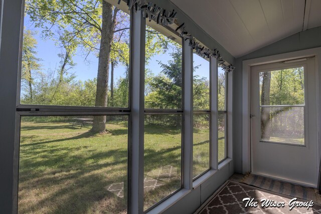 1261 W Channel St, Bitely, MI 49309 - unfurnished sunroom featuring vaulted ceiling