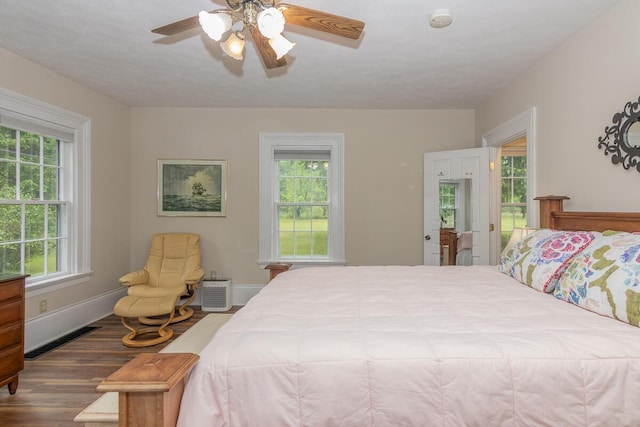 7610 W Kl Ave, Kalamazoo, MI 49009 - bedroom with wood finished floors, baseboards, and ceiling fan