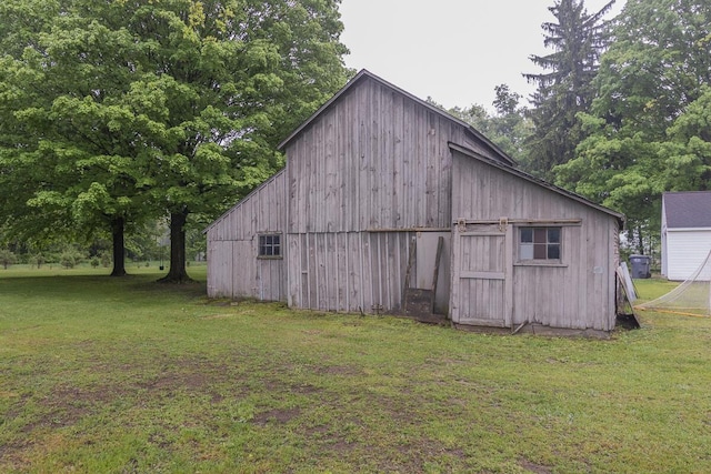 7610 W Kl Ave, Kalamazoo, MI 49009 - view of barn with a yard