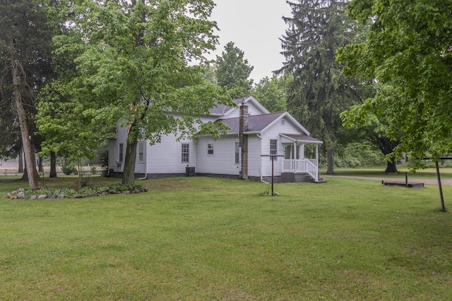 7610 W Kl Ave, Kalamazoo, MI 49009 - view of property exterior featuring a lawn