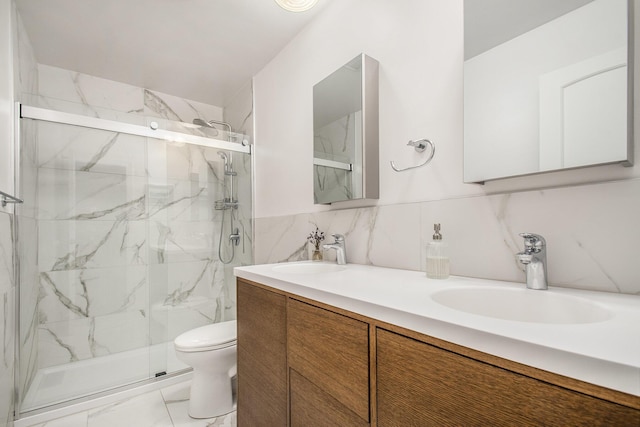 515 Springfield Cir, Niles, MI 49120 - full bathroom with a marble finish shower, toilet, marble look tile flooring, double vanity, and tile walls