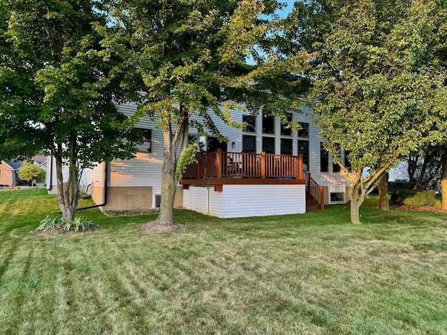 8460 Woodridge Dr, Davison, MI 48423 - rear view of property with stairs, a lawn, and a deck