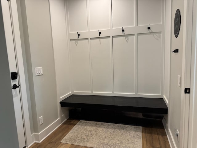 8460 Woodridge Dr, Davison, MI 48423 - mudroom featuring dark wood-style flooring and baseboards