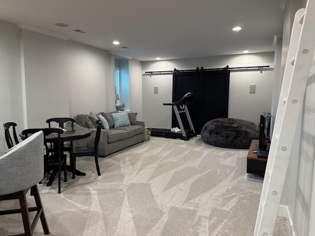 8460 Woodridge Dr, Davison, MI 48423 - living area featuring a barn door, light carpet, recessed lighting, and crown molding