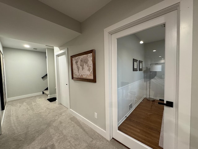 8460 Woodridge Dr, Davison, MI 48423 - hallway with baseboards, stairway, recessed lighting, and carpet