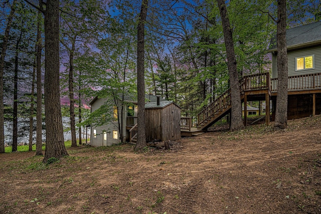13085 S Englewright Dr, Sand Lake, MI 49343 - view of yard with stairs and a wooden deck