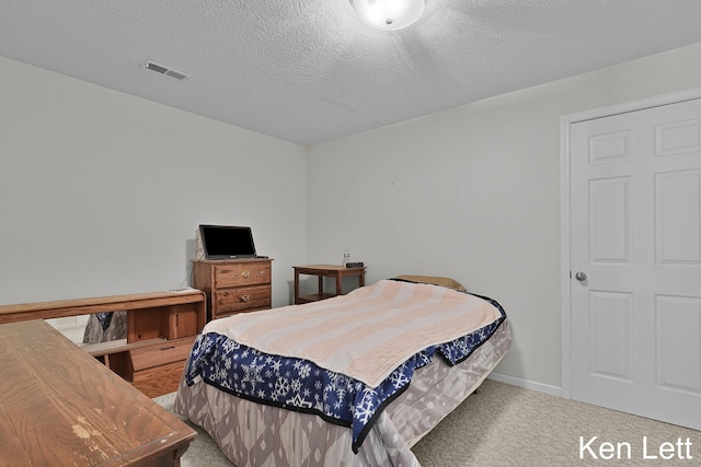 936 Amber View Dr SW Unit 160, Byron Center, MI 49315 - bedroom featuring carpet, baseboards, and a textured ceiling