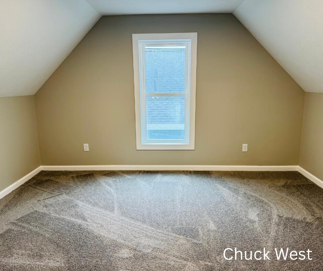 1479 Terrace St, Muskegon, MI 49442 - bonus room featuring carpet floors, baseboards, and vaulted ceiling