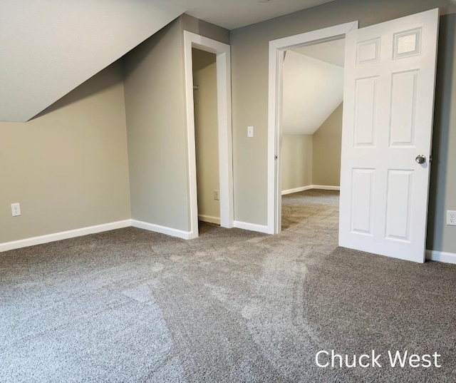 1479 Terrace St, Muskegon, MI 49442 - additional living space with carpet, vaulted ceiling, and baseboards