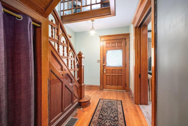 110 N O Keefe St, Cassopolis, MI 49031 - entryway with stairway, baseboards, and light wood-style floors