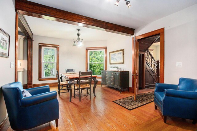 110 N O Keefe St, Cassopolis, MI 49031 - dining space with plenty of natural light, light wood-style floors, and beamed ceiling