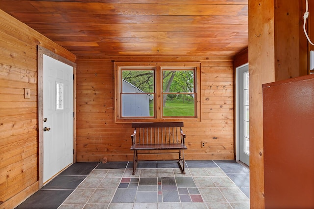 8001 S Jackson Rd, Jackson, MI 49201 - foyer with wood ceiling and wooden walls