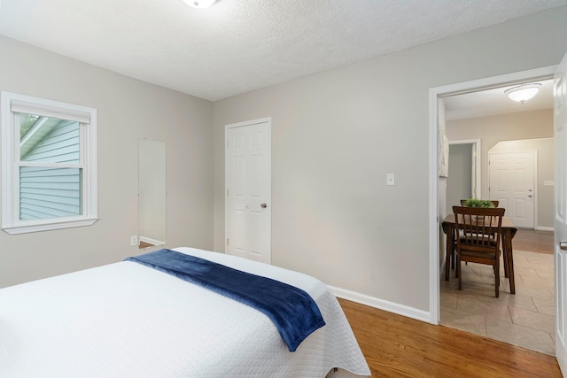 4121 Quebec St, Auburn Hills, MI 48326 - bedroom featuring light wood finished floors and baseboards