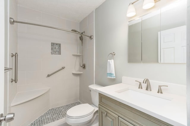 4121 Quebec St, Auburn Hills, MI 48326 - bathroom featuring tiled shower, toilet, and vanity