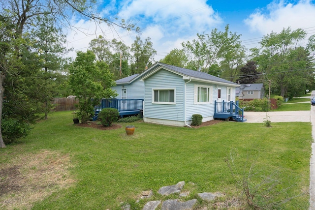 4121 Quebec St, Auburn Hills, MI 48326 - view of side of property with a wooden deck
