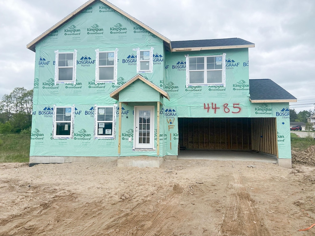 4485 Coneflower Ct SE, Grand Rapids, MI 49512 - property in mid-construction with a garage
