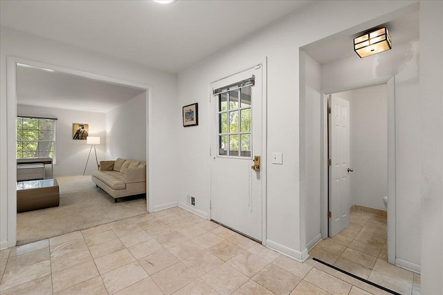 4948 Hardwoods Dr, West Bloomfield, MI 48323 - foyer with light tile patterned flooring and baseboards