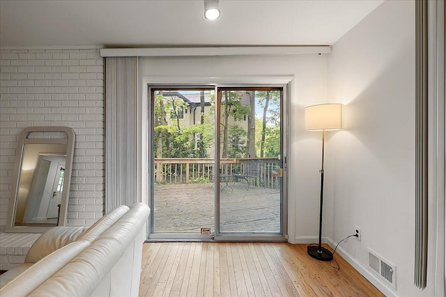 4948 Hardwoods Dr, West Bloomfield, MI 48323 - doorway to outside with hardwood / wood-style floors and baseboards