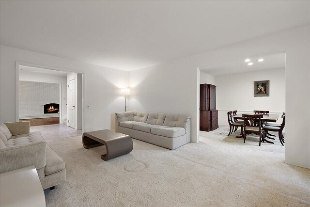 4948 Hardwoods Dr, West Bloomfield, MI 48323 - carpeted living room featuring a fireplace and recessed lighting