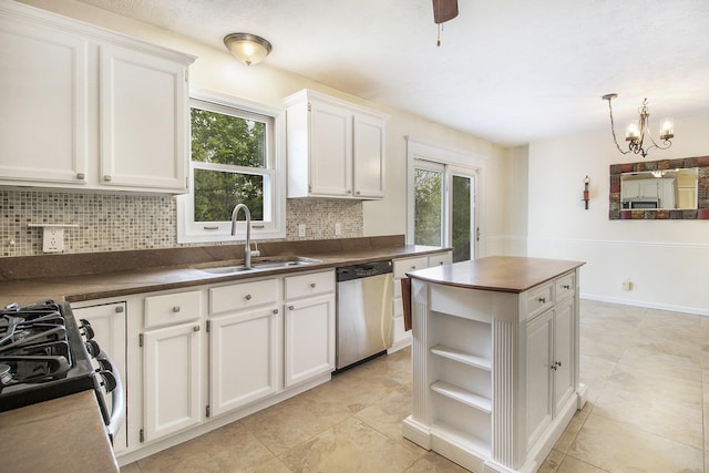 7289 Eagle Ter, Mattawan, MI 49071 - kitchen with appliances with stainless steel finishes, a sink, backsplash, dark countertops, and healthy amount of natural light