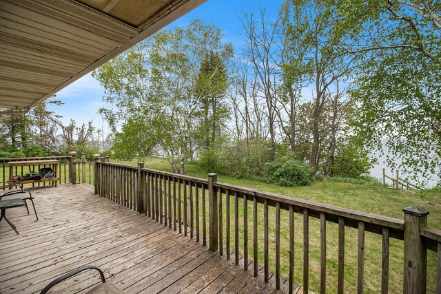 4771 S Lakeshore Dr, Ludington, MI 49431 - deck featuring a yard