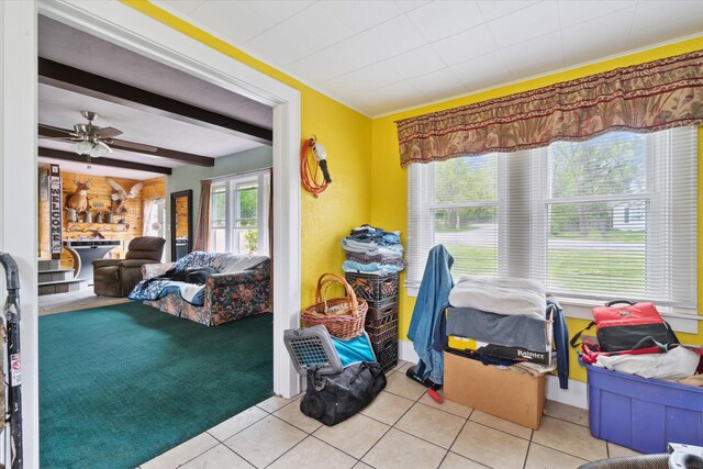 806 W Centre Ave, Portage, MI 49024 - bedroom featuring light tile patterned floors and beam ceiling